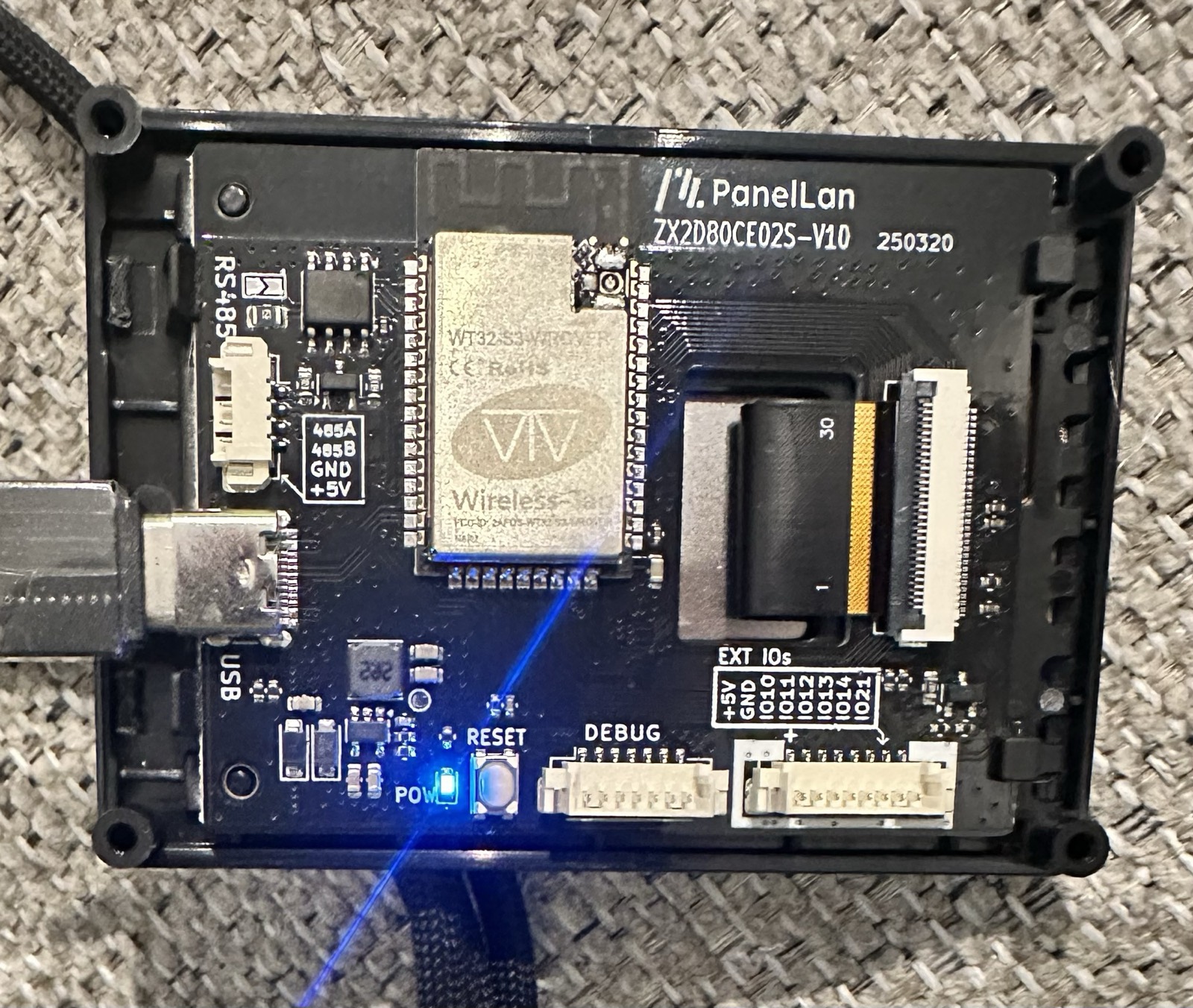 The back of the ESP32-S3 board showing the PanelLan label